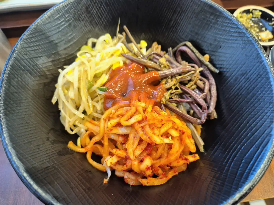 Herb bibimbap mixed with gochujang