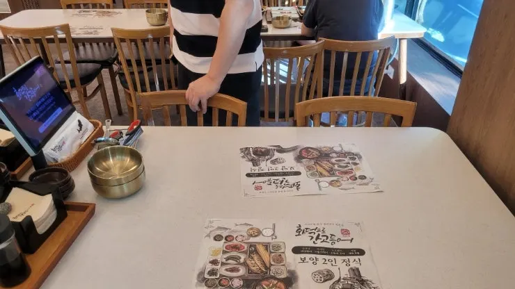 Interior of the restaurant with a tablet at every table