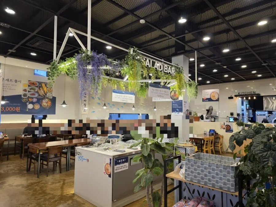 View of the dining hall with widely spaced tables
