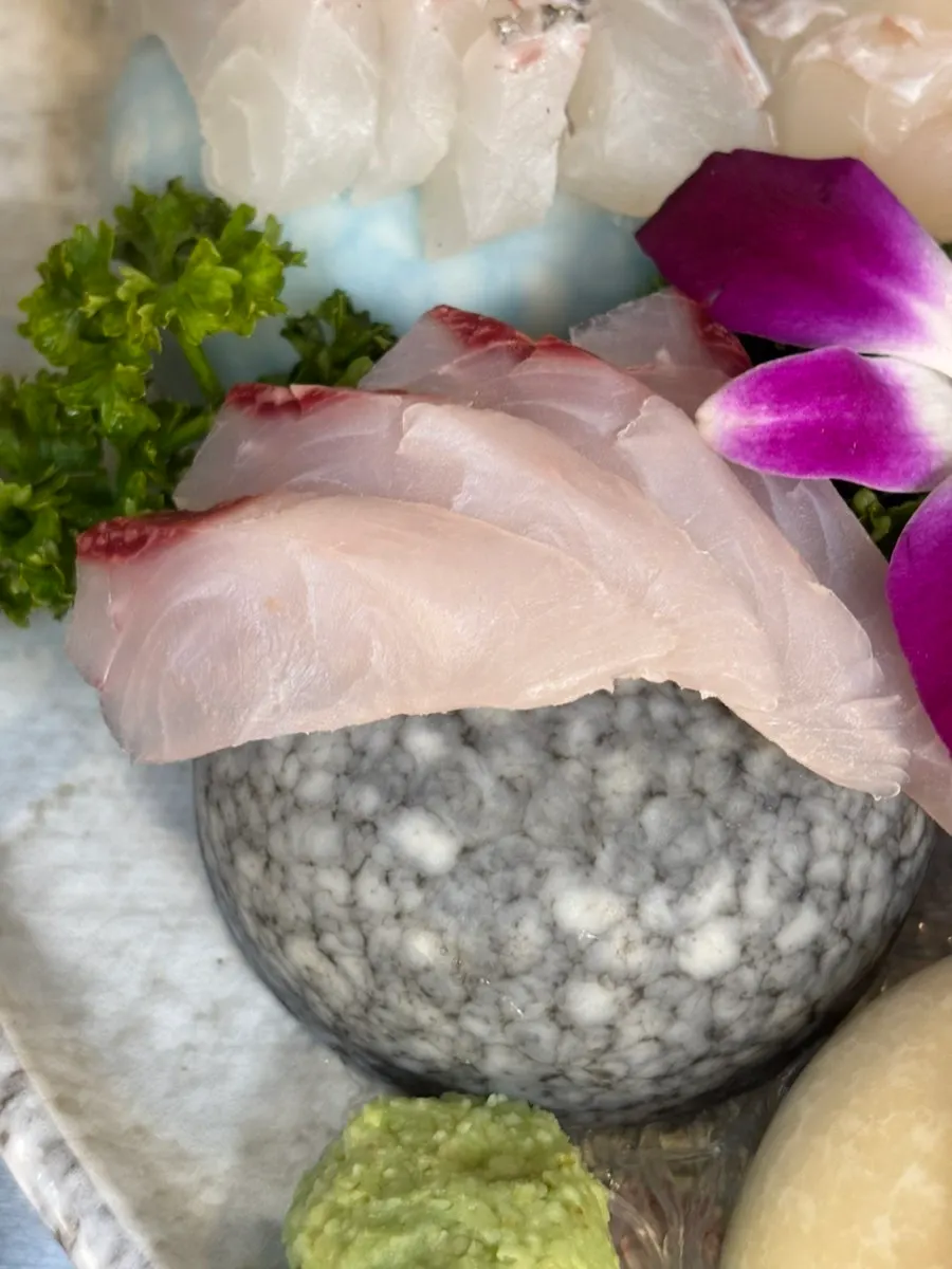Thickly sliced mullet sashimi