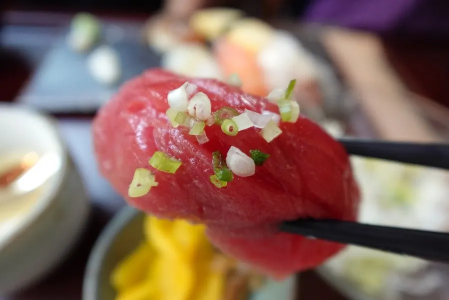 Flounder, salmon, and soy-marinated shrimp sushi