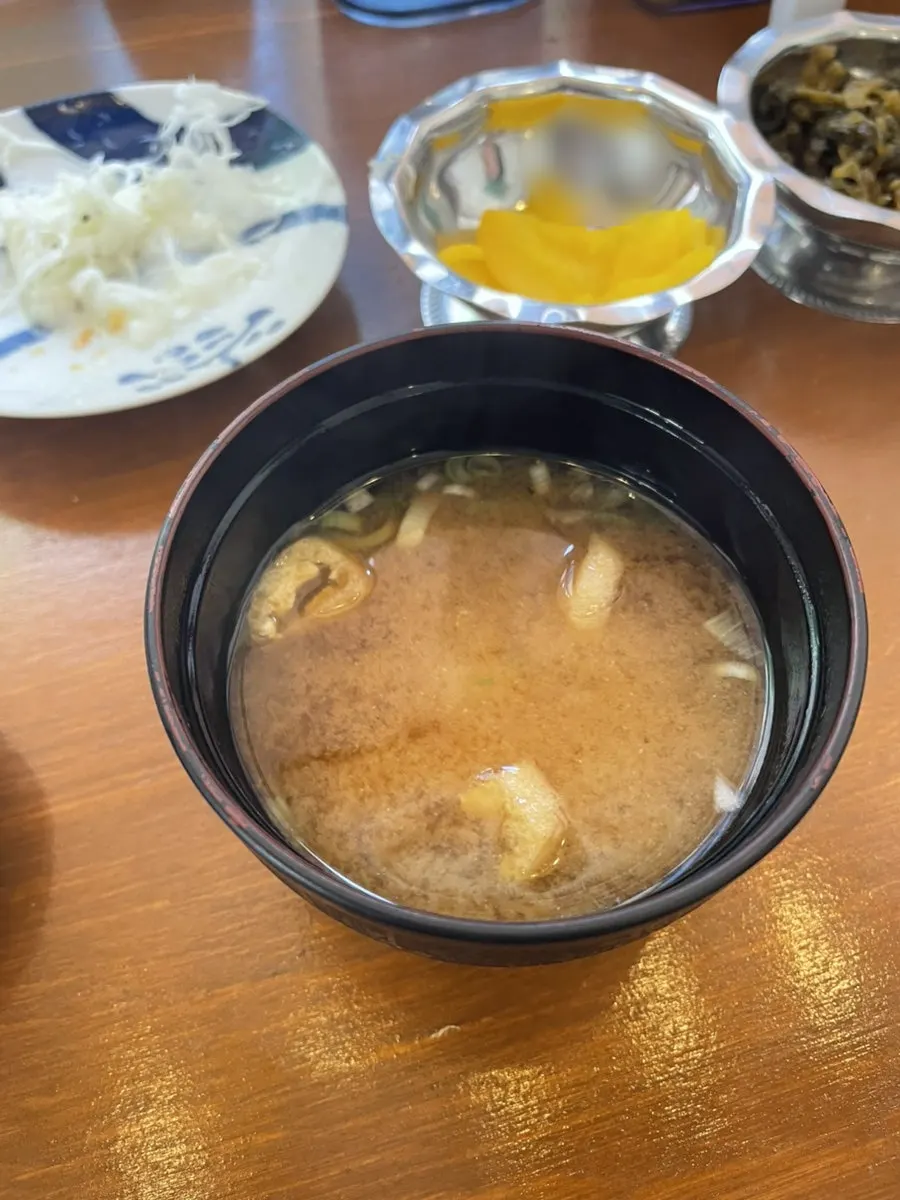Miso soup served alongside the meal