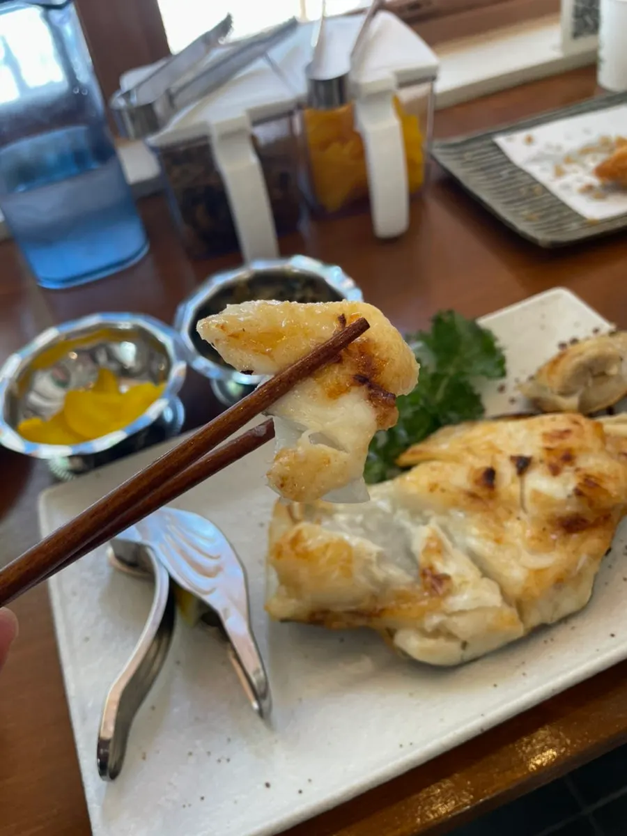Close-up of the salt-grilled black cod's flesh