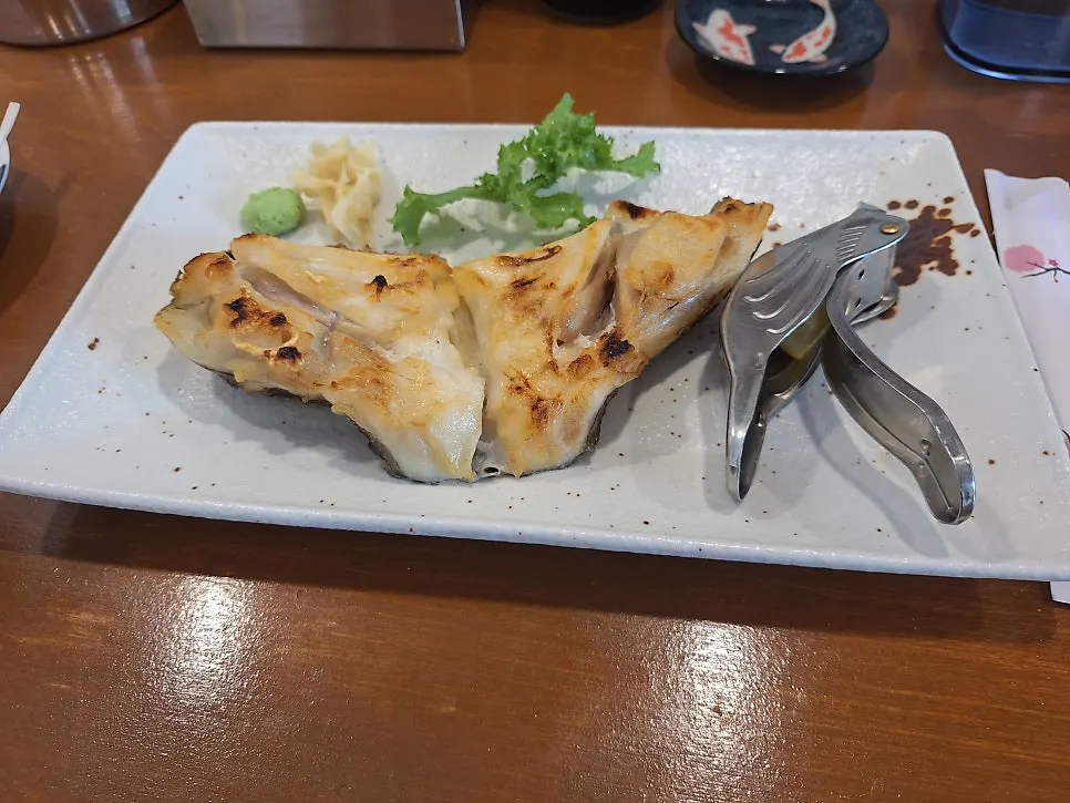 The neatly plated salt-grilled black cod set