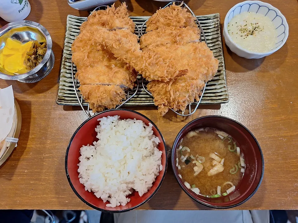The special pork katsu topped with two pieces of katsu and shrimp tempura