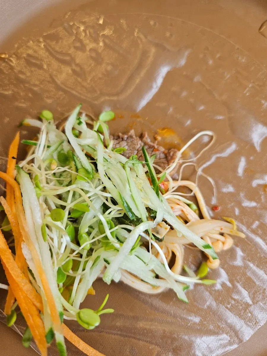 Shabu-shabu enjoyed as Vietnamese spring rolls