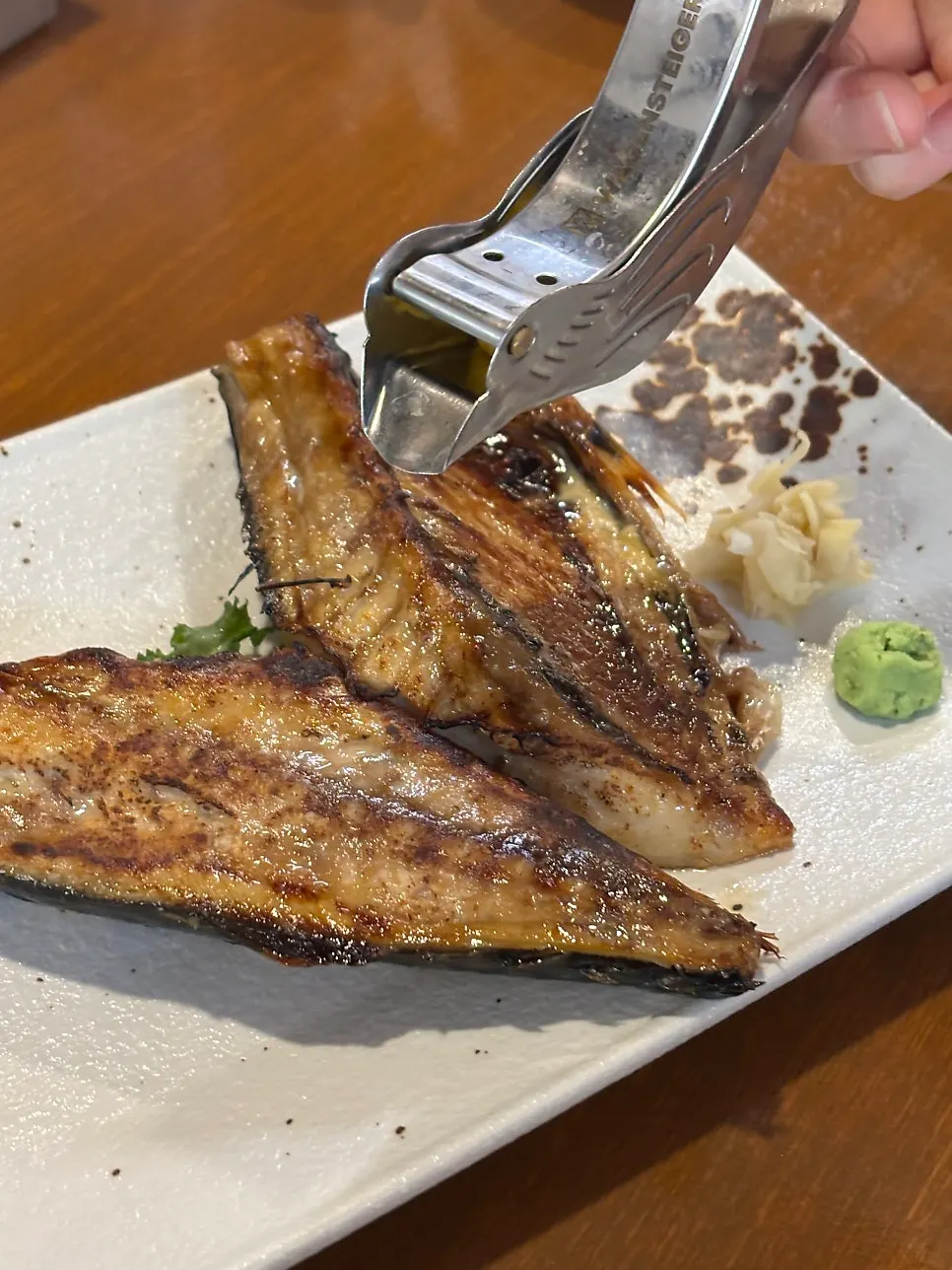 Cross-section of the crisp-outside, moist-inside grilled fish