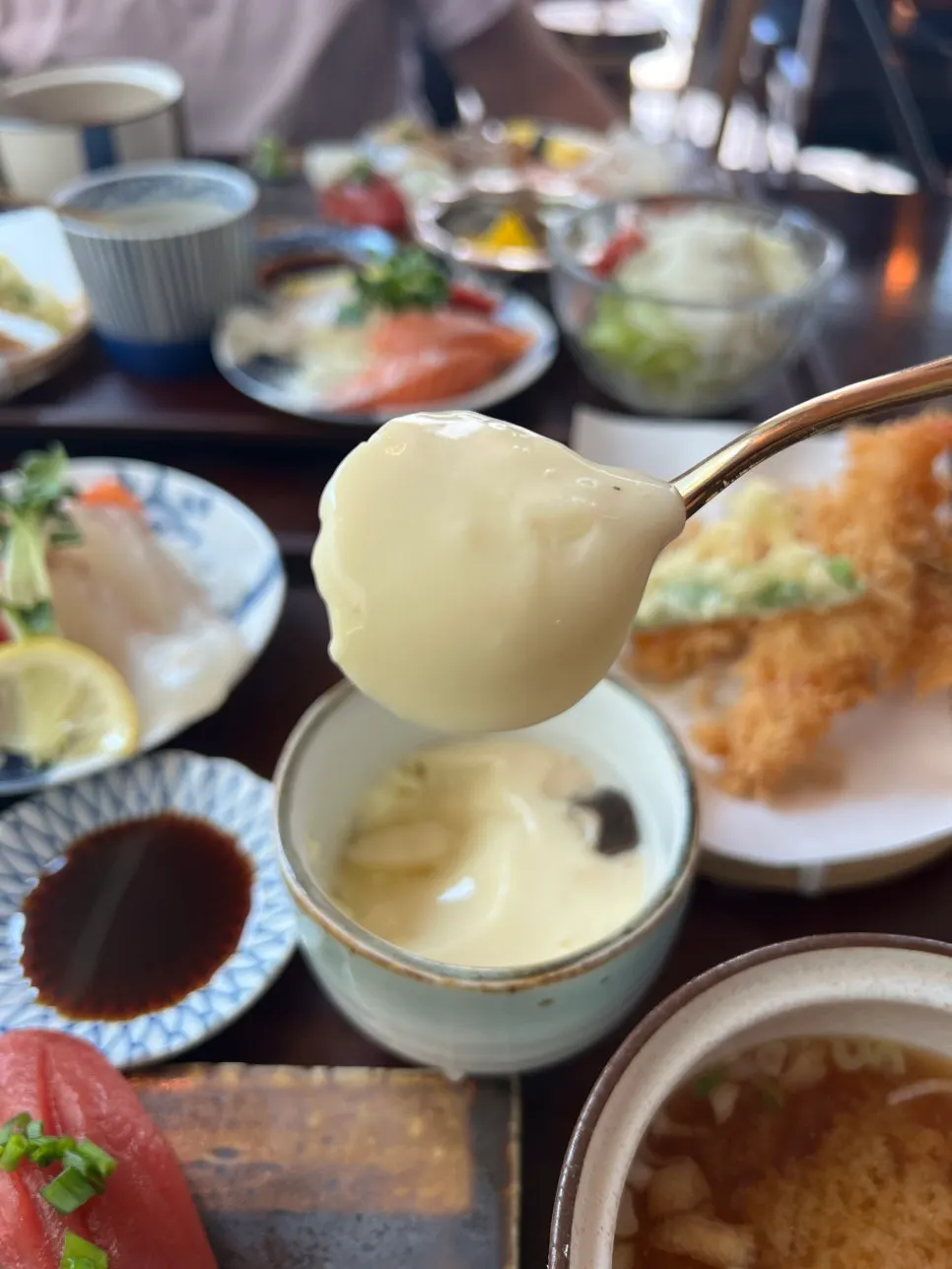 A spoonful of chawanmushi with shrimp and mushrooms