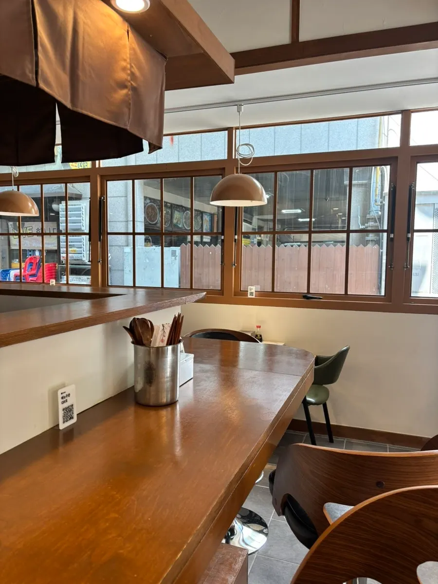 Interior of Min Cook Misoyaki with wood-tone decor
