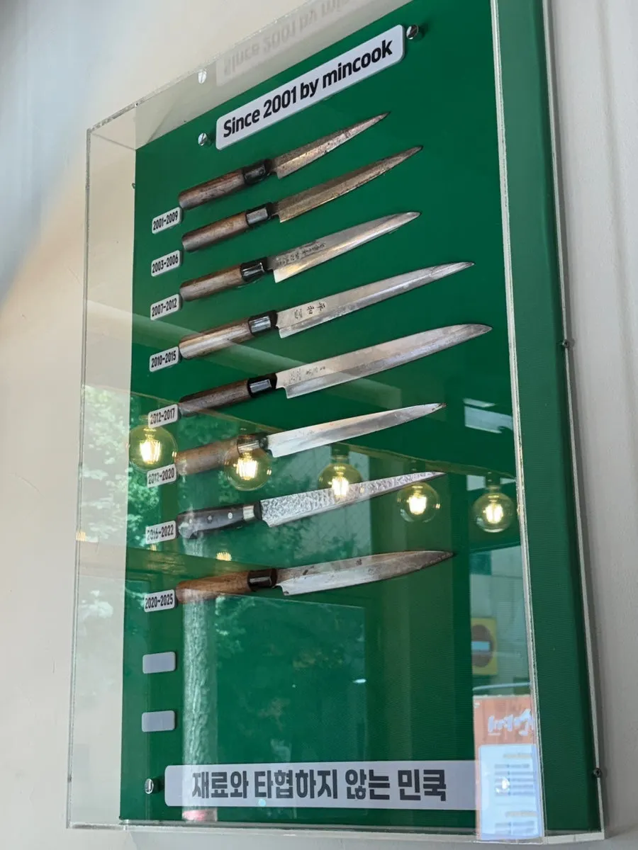 An old Japanese knife displayed on the wall