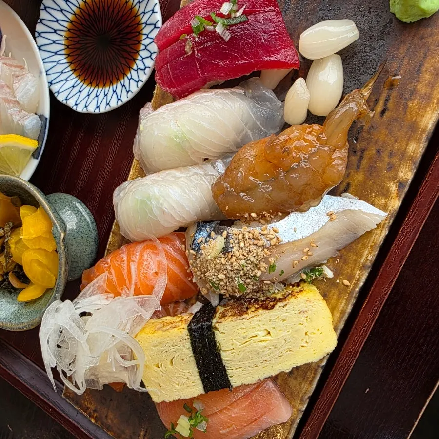 A generously plated assortment of sushi