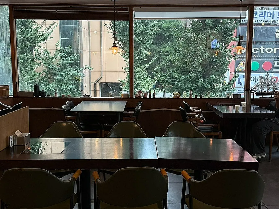 Interior of Min Cook Dasima with wide table spacing