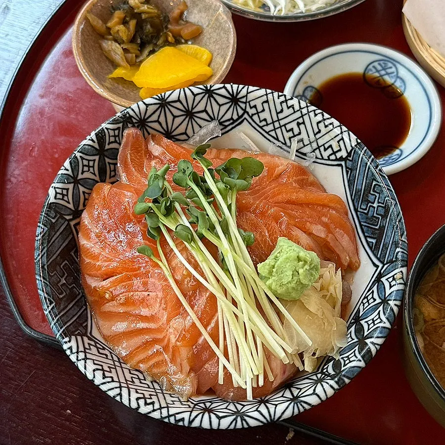 Sake-don rice bowl piled high with raw salmon