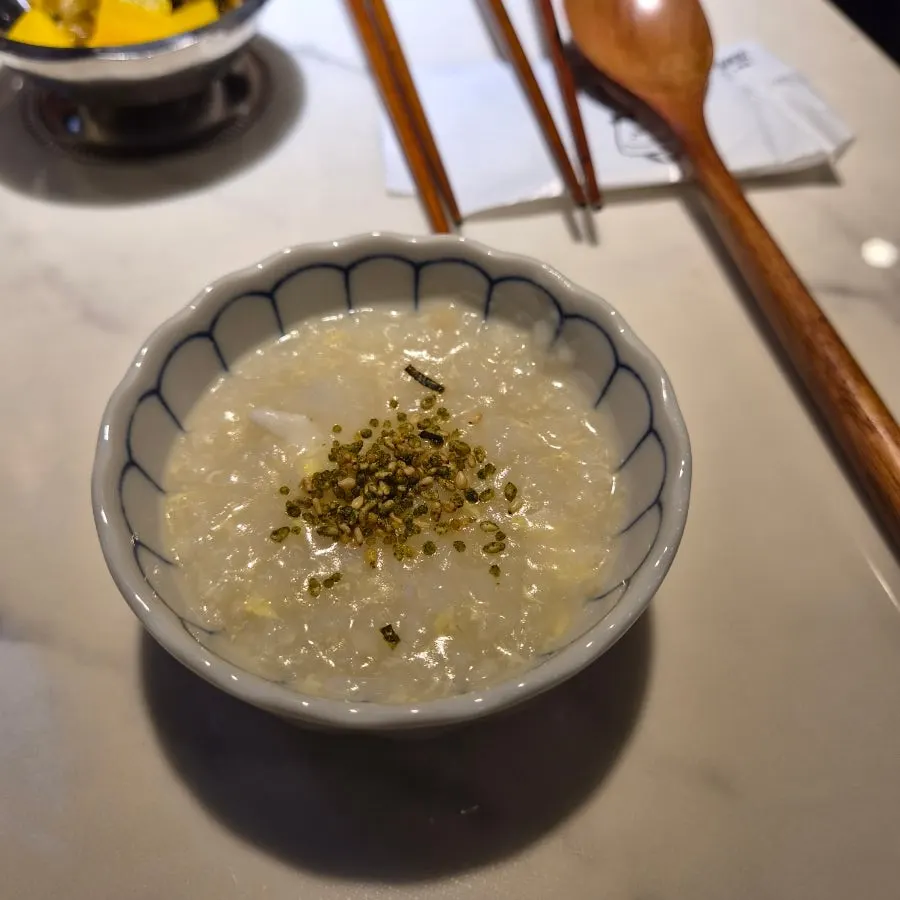 A bowl of complimentary egg porridge