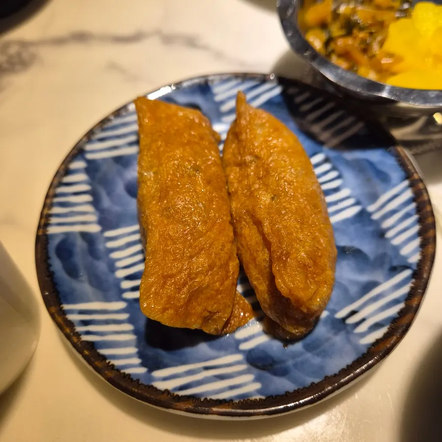 Inari sushi (2 pieces) ordered as a side