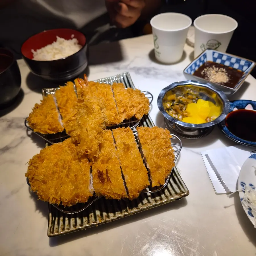 A plate of pork katsu, 2 pieces