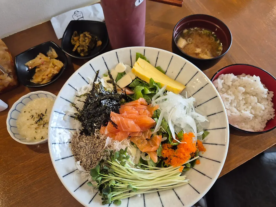 Fresh salmon bowl piled with vegetables