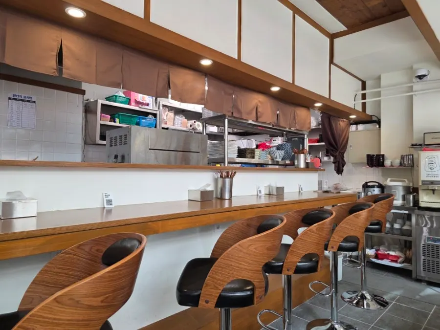 Wood-toned interior of Min Cook Misoyaki