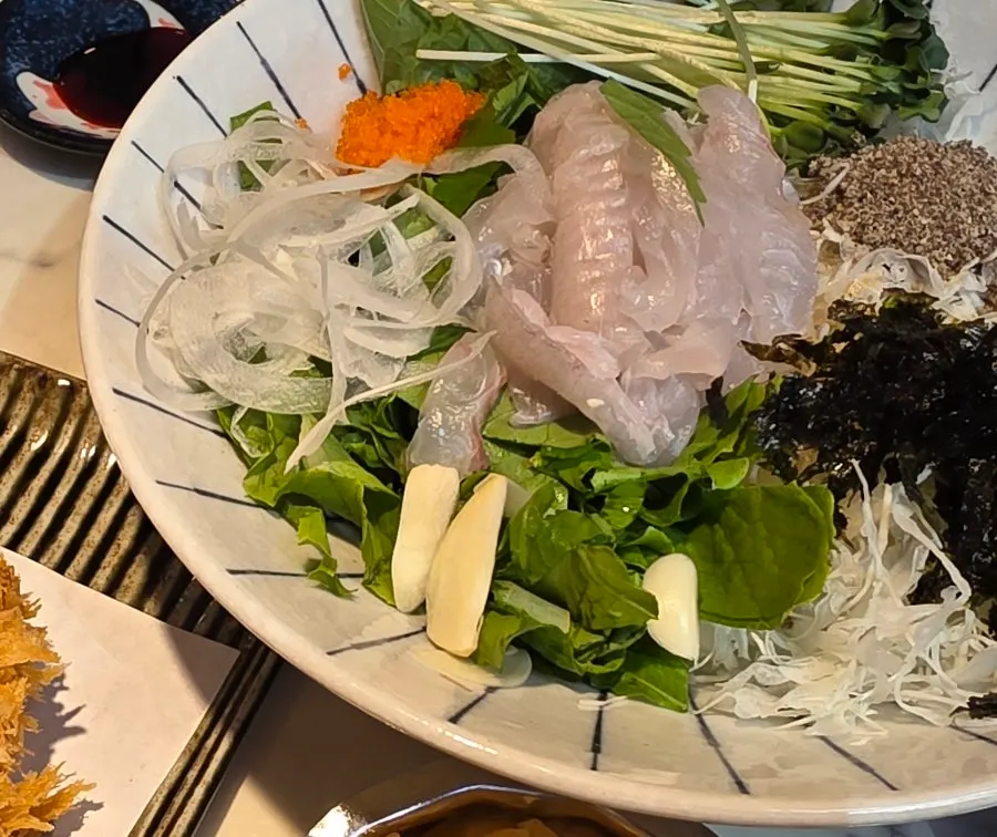 Flounder hoedeopbap mixed with chojang sauce