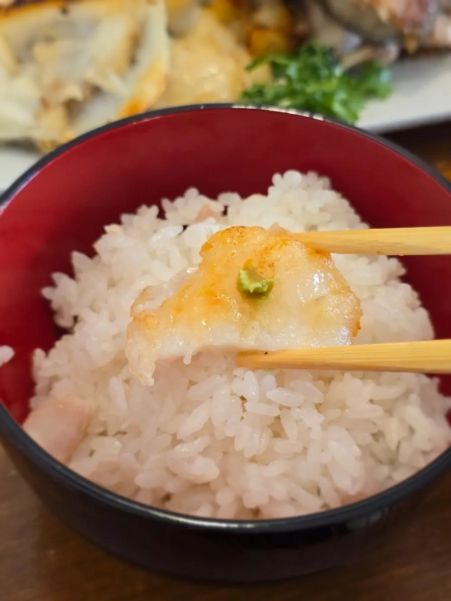 A piece of black cod grill placed on rice
