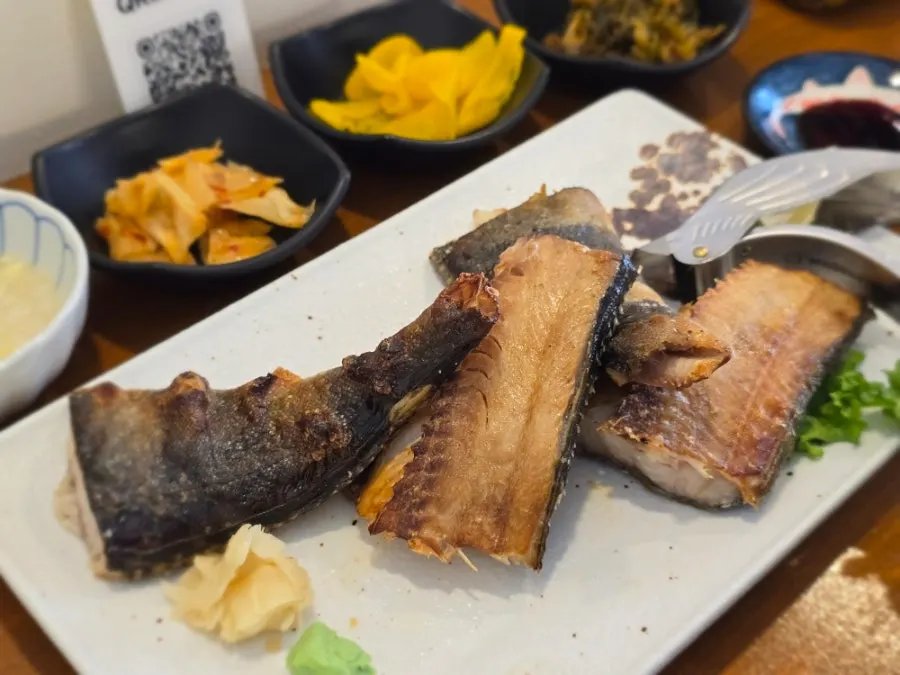Salt-grilled Atka mackerel table spread