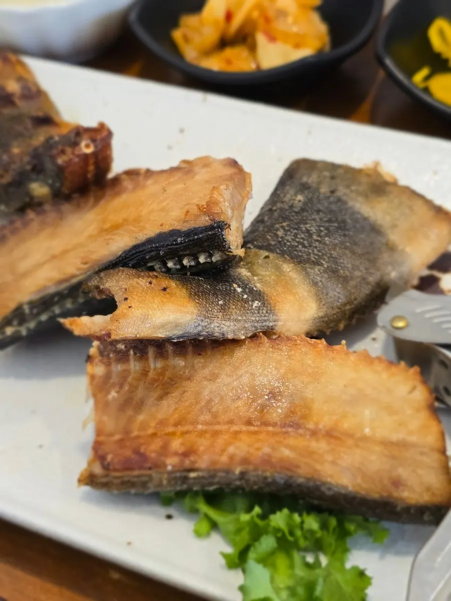 Large pieces of Atka mackerel grill