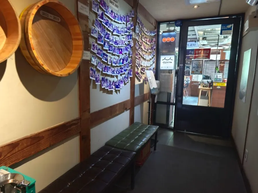 Hundred-Year Store certification plaque hung at the entrance of Min Cook Dasima