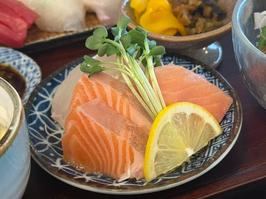 Plate of salmon sashimi from the sushi set special