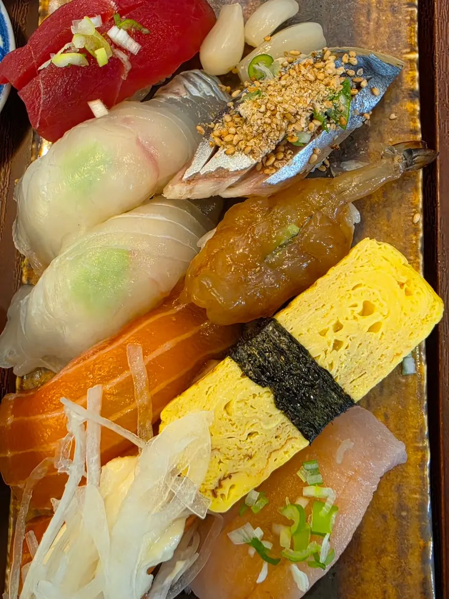Special sushi set with salad, tempura, and steamed egg