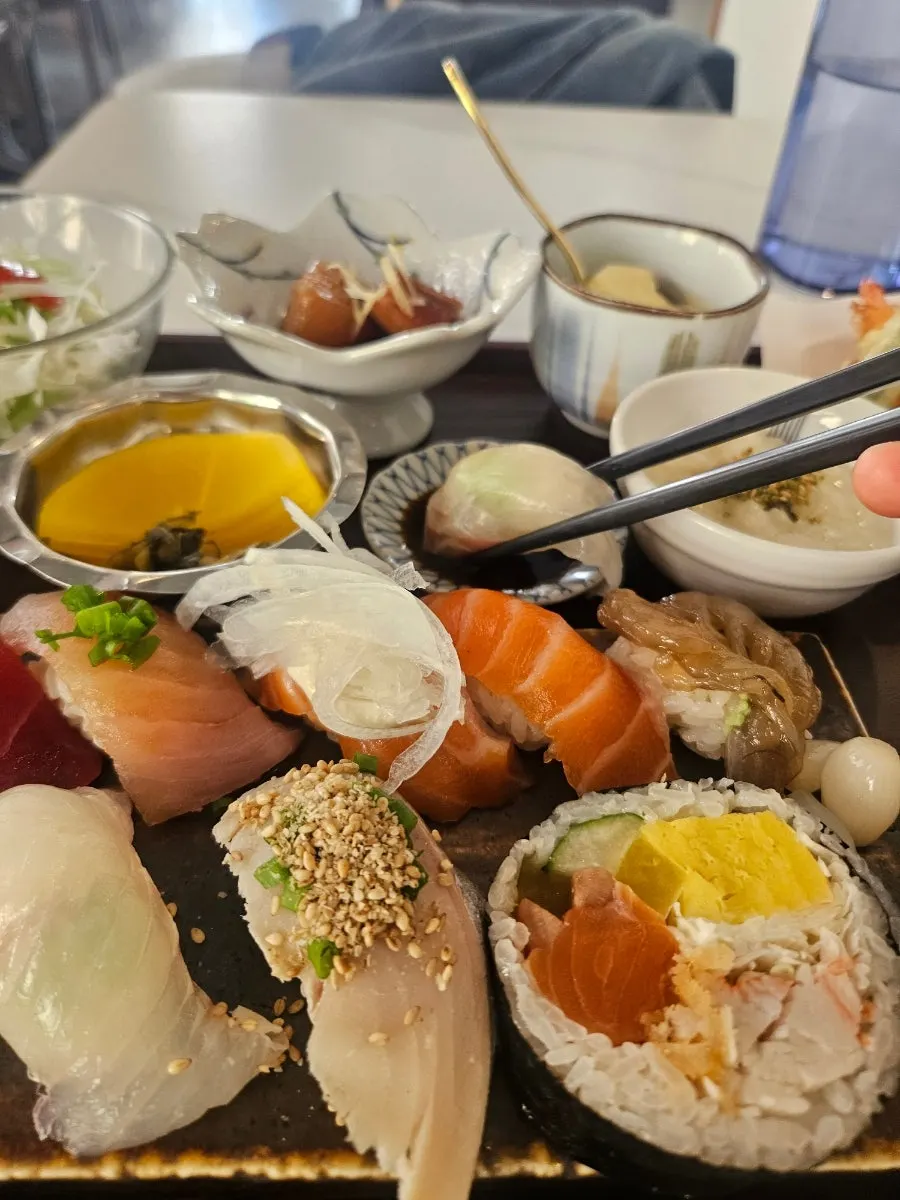 Close-up of shime saba and tuna sushi