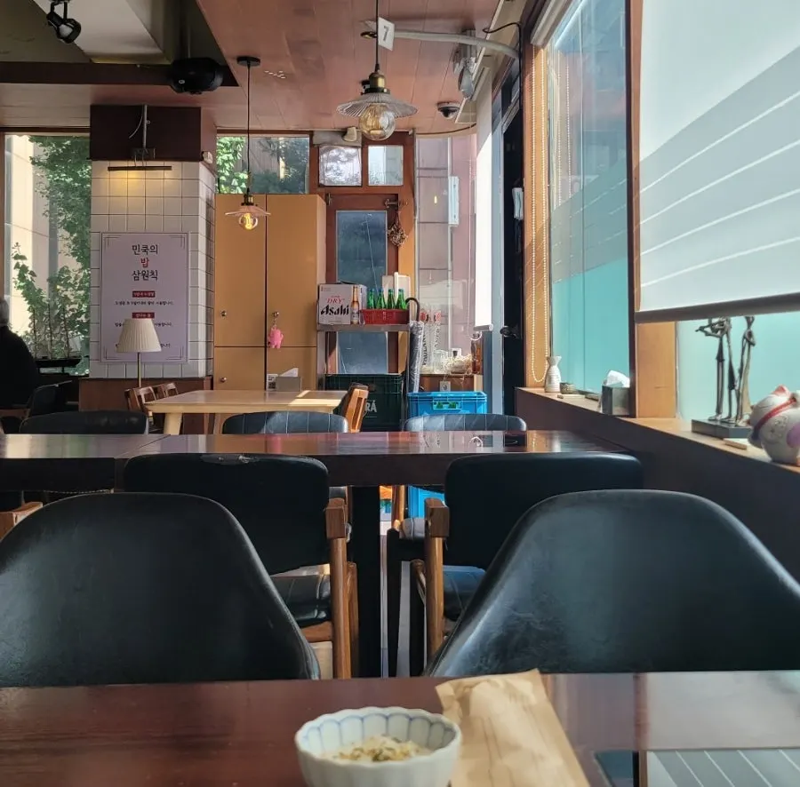 Restaurant seating with generous table spacing