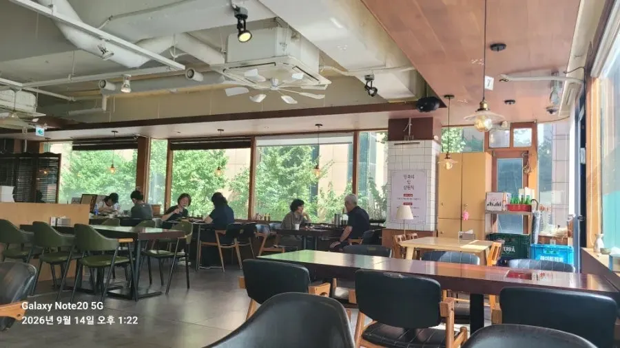 View of the cozily decorated sushi restaurant hall