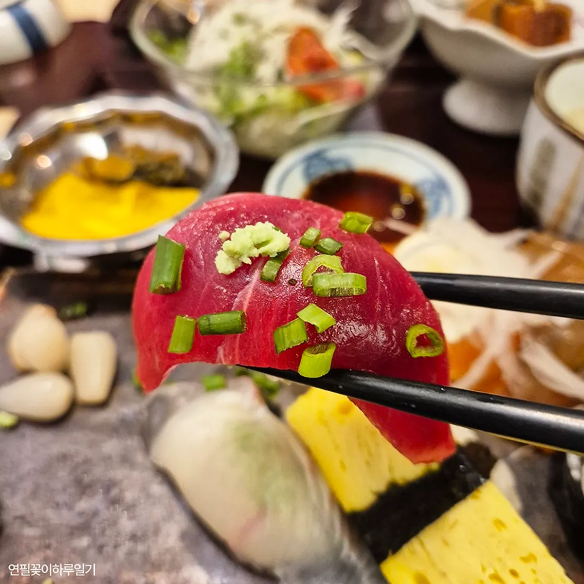 Main sushi plate with thick cuts of raw fish