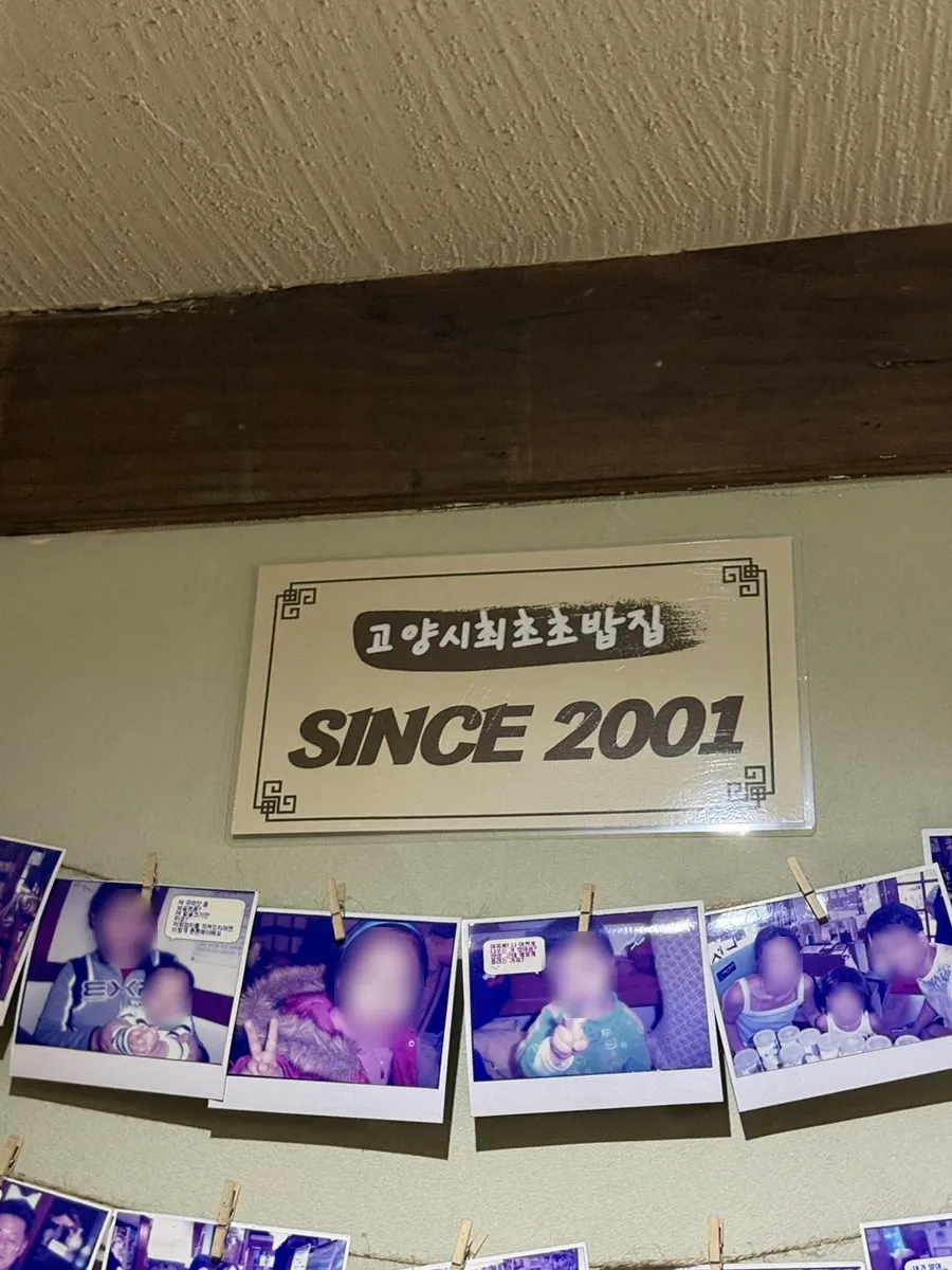 Hundred-Year Store certification and Blue Ribbon mark at the Min Cook Dasima entrance