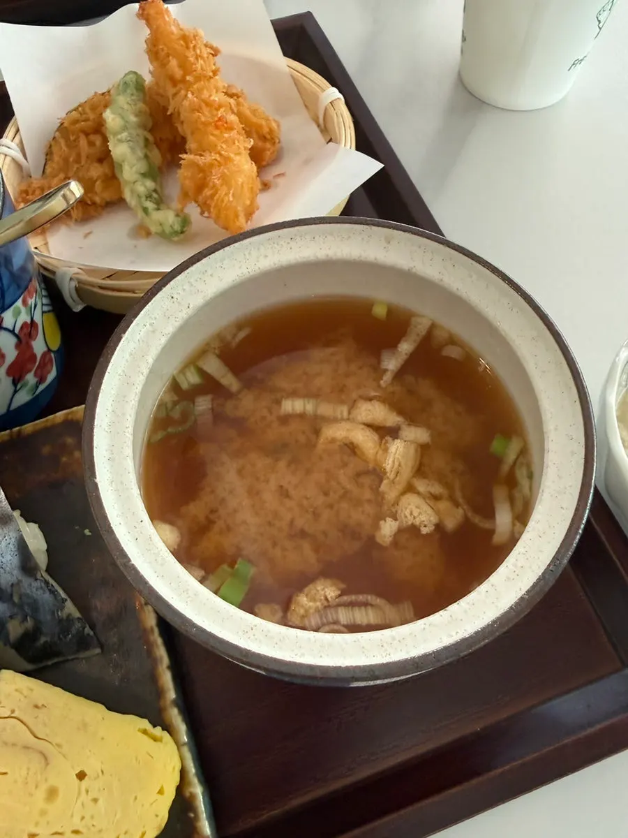 Miso soup and steamed egg served alongside the sushi set meal