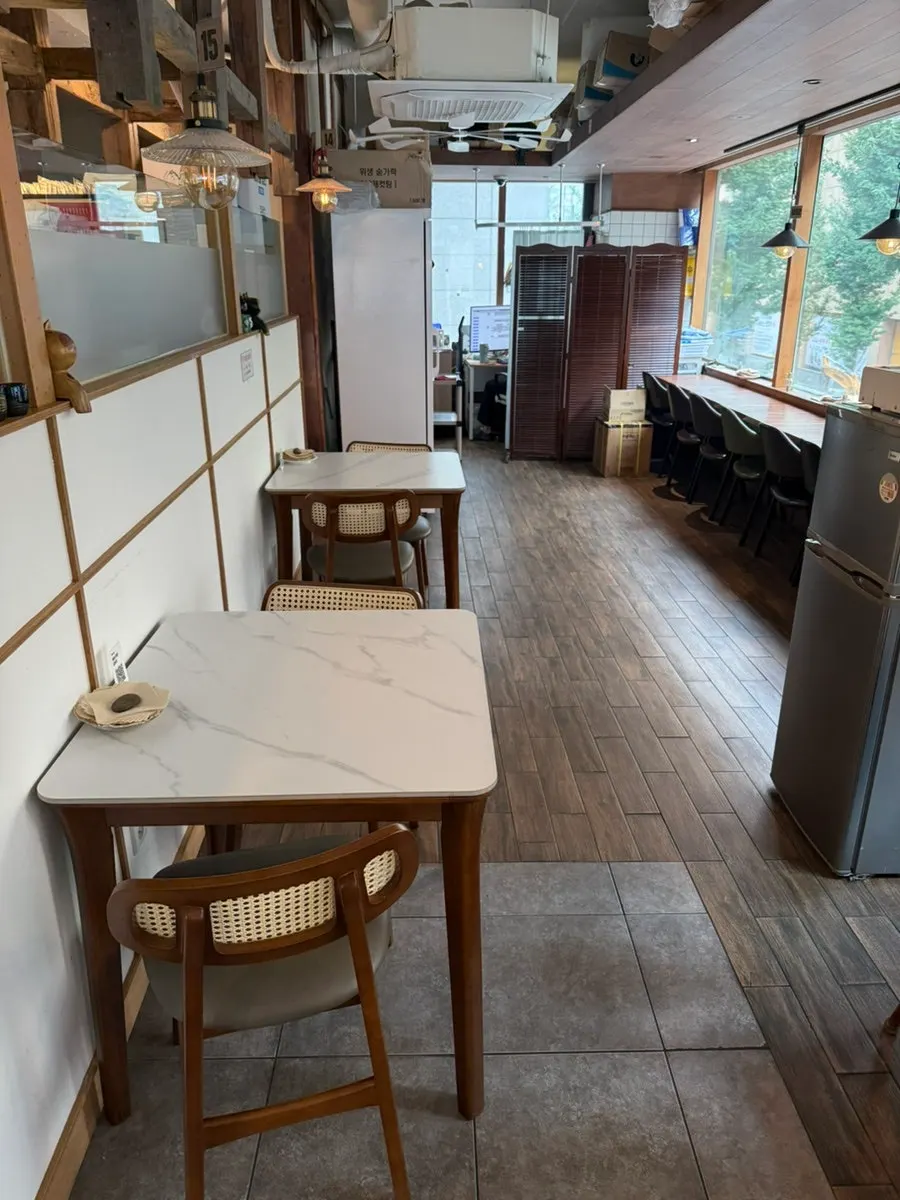 Four-person table seating at Min Cook Dasima