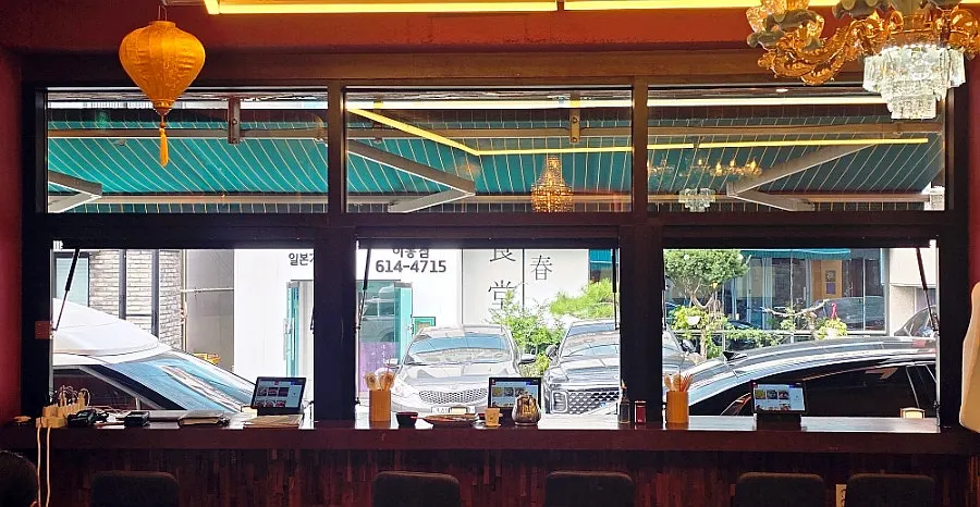 Window-side solo dining seats at Hwamok Restaurant Gaekjan