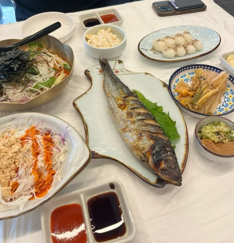 Banchan side dishes laid out on the table