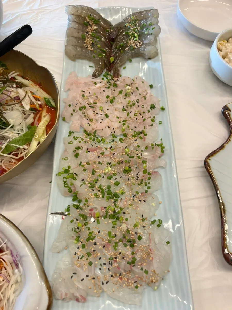 Plate of plump raw shrimp sashimi