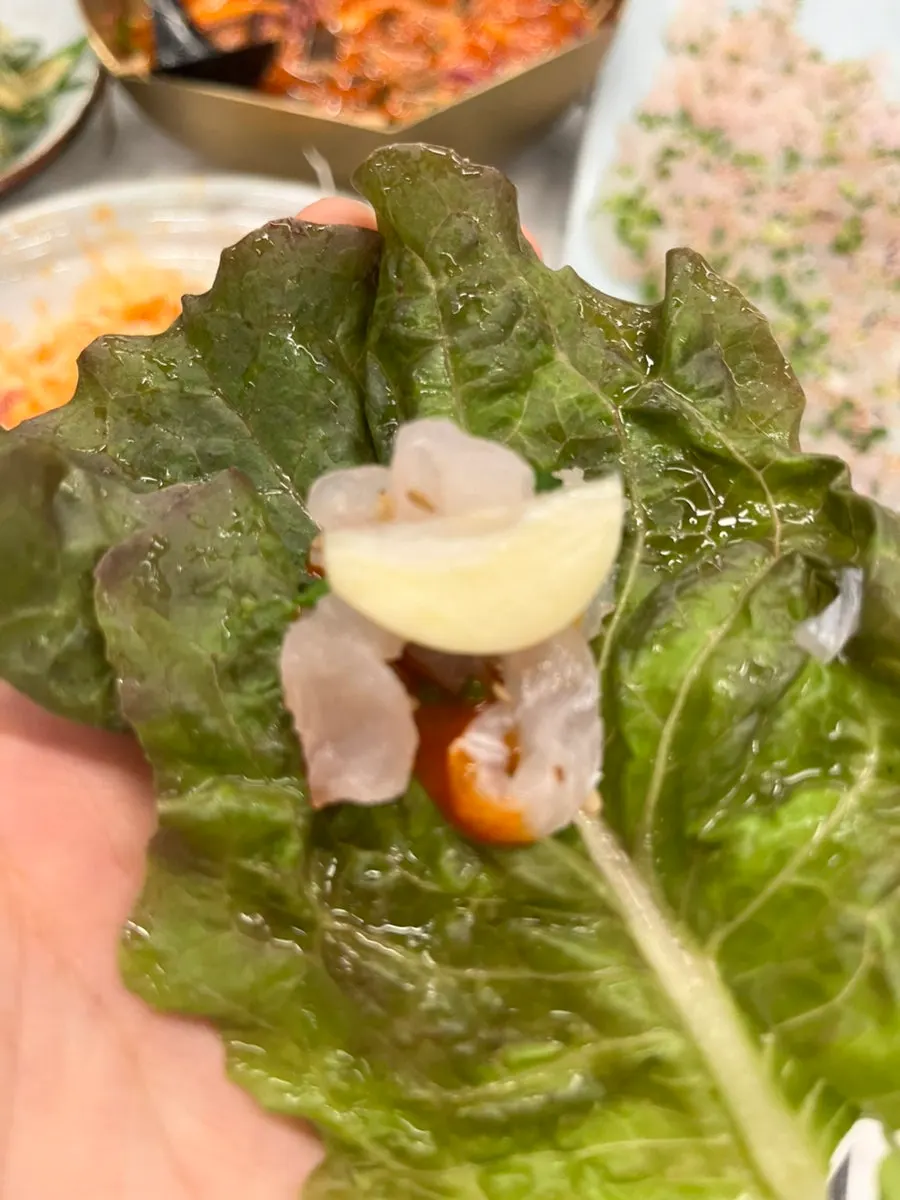 Sashimi wrapped with seaweed and aged kimchi