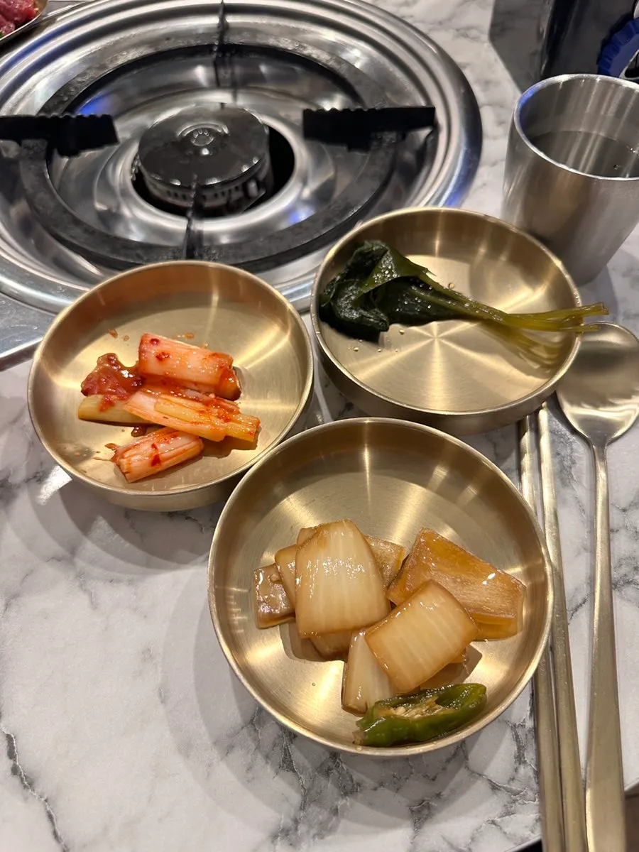 Gopchang sauce served on individual dipping plates