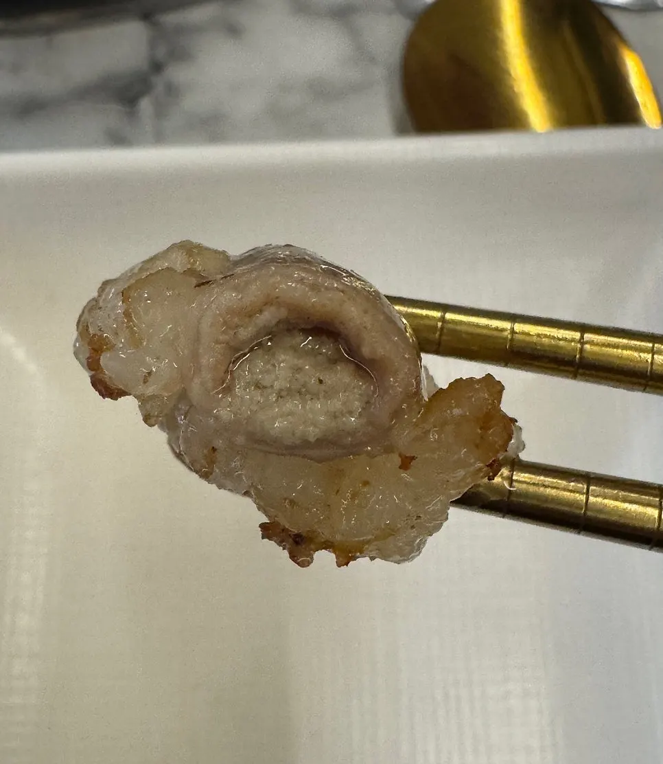 살짝 익힌 염통 한 점