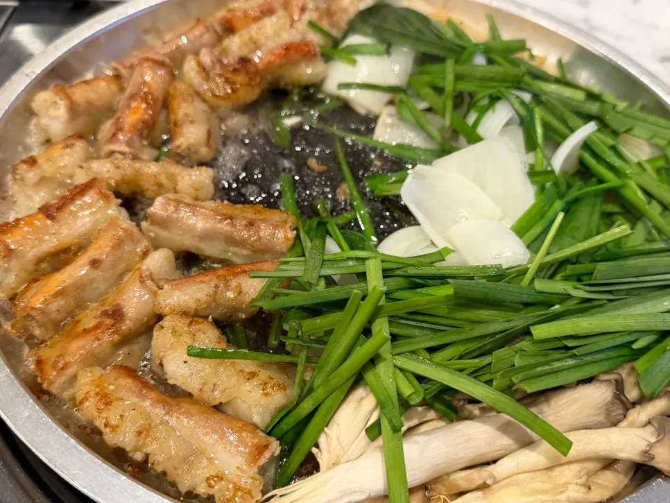 Hanwoo gopchang cooking on the grill