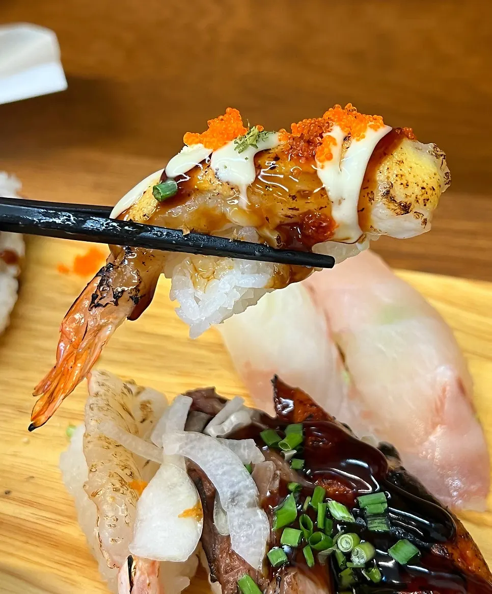 Two sushi sets placed side by side