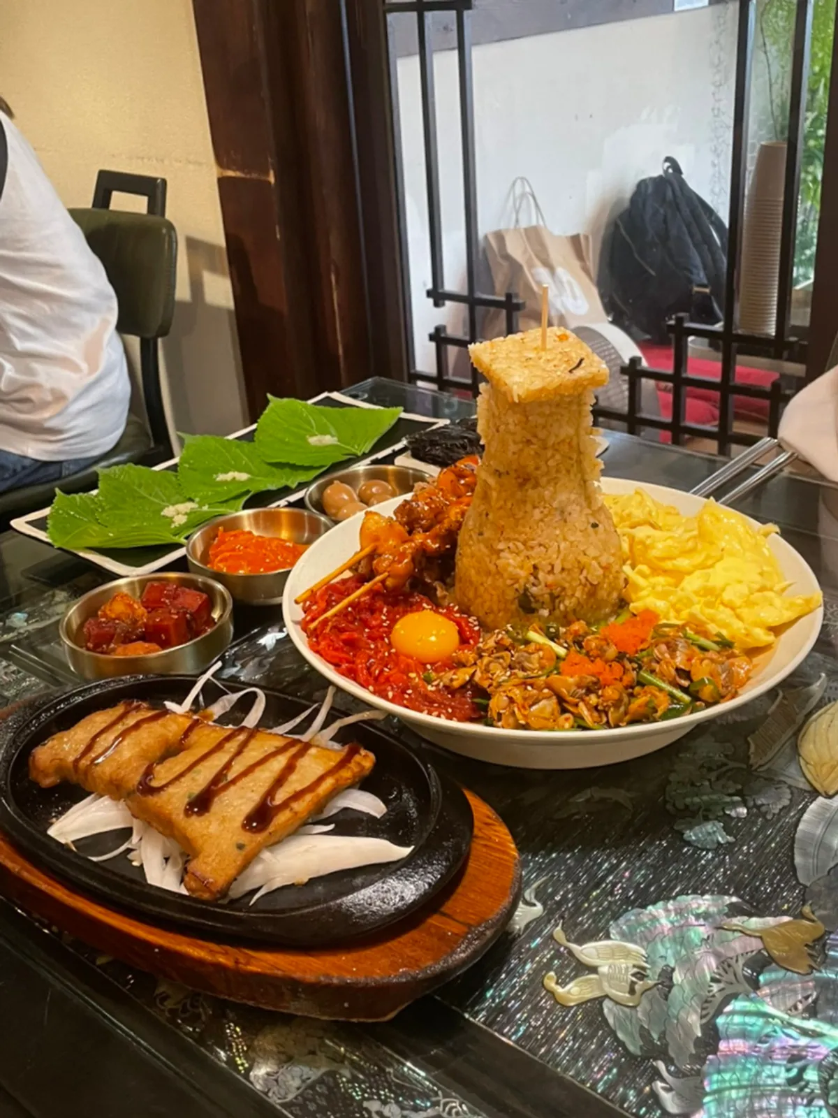 Perilla leaf wrap topped with flying fish roe