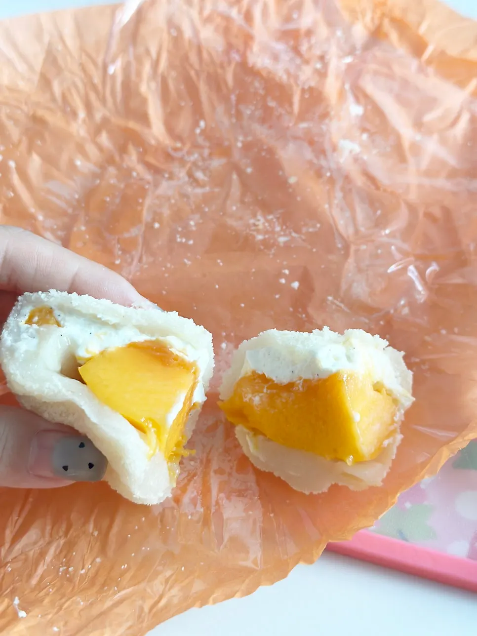 Inside of the pineapple mochi filled with cream and red bean