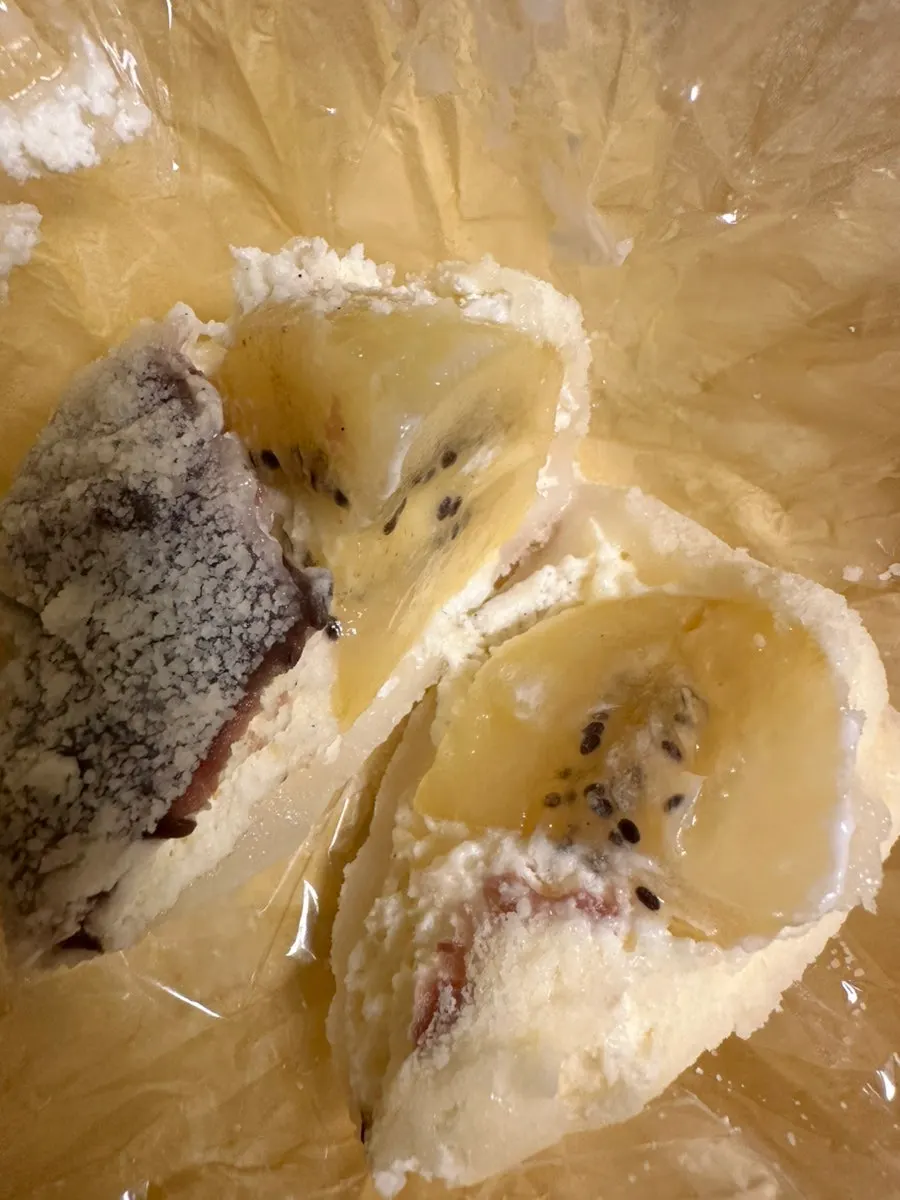 Peach mochi cross-section with pink fruit flesh