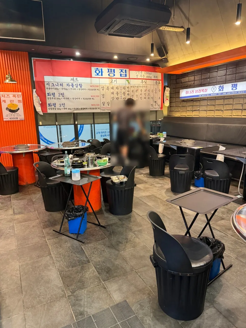 Spacious indoor hall seating at Hwapyeongjip