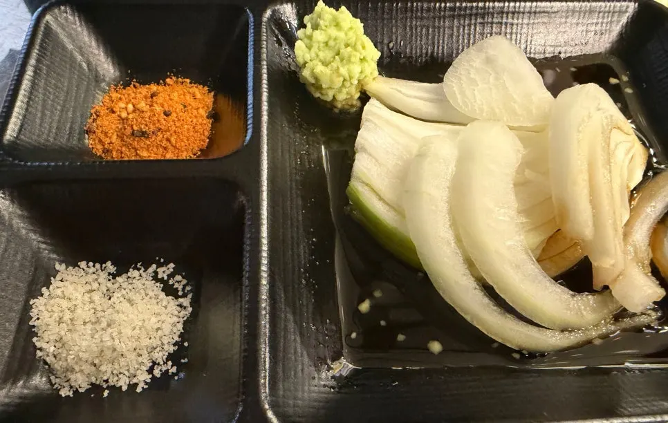 Small plate of salt and pickled onions