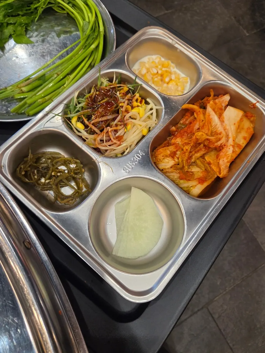 Basic side dishes on a retro metal tray